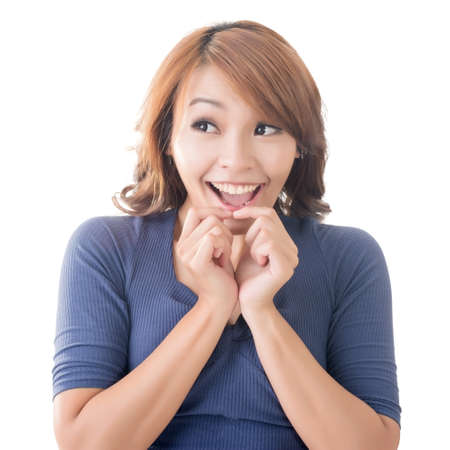 Surprised Asian woman, closeup portrait.の写真素材