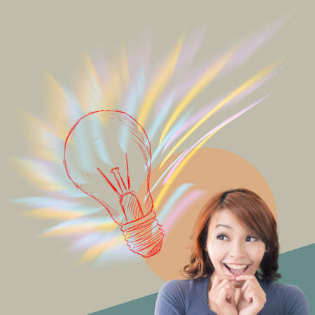 Surprised Asian woman with crazy idea. Concept of creativity, idea, inspiration etc.の写真素材
