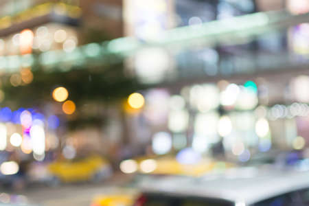 Abstract urban background with blurred buildings and street, shallow depth of focus.の写真素材