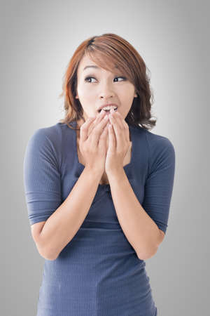 Asian woman face with expression, closeup portrait.の写真素材