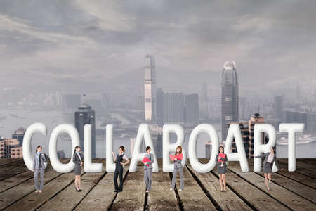 Concept of partner, friends,collaborate with group of business people stand with 3d text.の写真素材