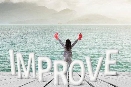 Fight for improve, concept images with 3d text and asian business woman under sky.の写真素材