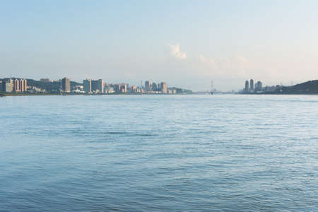 Scenery of Tamsui river with  famous Guandu Bridge far away in Tamsui, New Taipei City, Taiwan.の写真素材