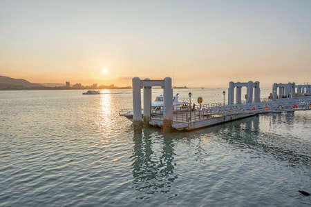 Tamsui scenery with dock and boat in the sunset, Taipei, Taiwan, Asia.のeditorial素材