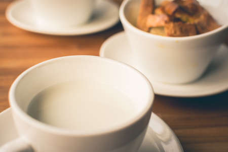 Scene of breakfast with a cup of milk and toast in the morning.の写真素材