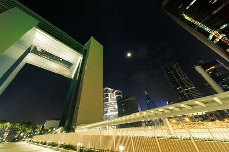 Hong Kong skyline in night with skyscrapers against sky.の写真素材