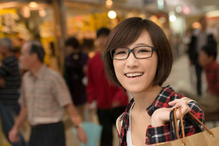 Shopping young girl of Asian at mall in Taipei, Taiwan.の写真素材