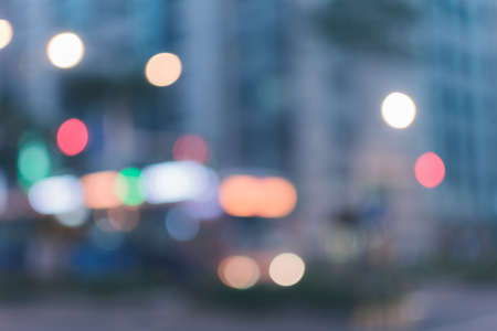 Abstract urban background with blurred buildings and street, shallow depth of focus.の写真素材