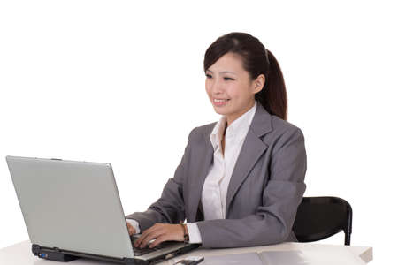Working business woman sitting on chair against white background.の写真素材