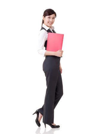Young attractive business woman of Asian, full length portrait isolated on white.の写真素材