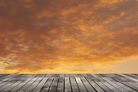 Scenic of clouds on heaven above the ground. Good background for you to put text or people on the ground.の写真素材