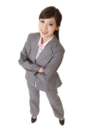 Young attractive business woman of Asian, full length portrait on white.の写真素材
