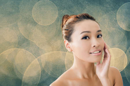 Asian beauty face closeup portrait with clean and fresh elegant lady.の写真素材