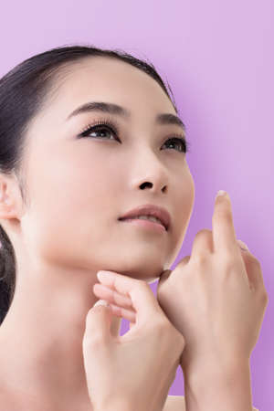 Asian beauty face, closeup portrait with clean and fresh elegant lady.の写真素材