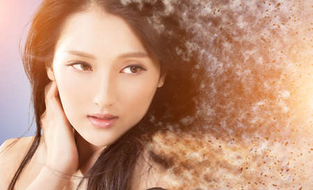 Beauty woman face with sand storm effectの写真素材