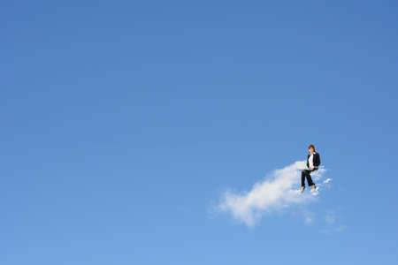 Asian business woman sit on the cloud