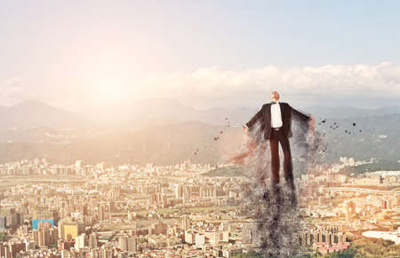 Concept of Asian business man flying over the sky.の写真素材