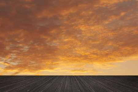 Scenic of clouds on heaven above the ground. Good background for you to put text or people on the ground.の写真素材