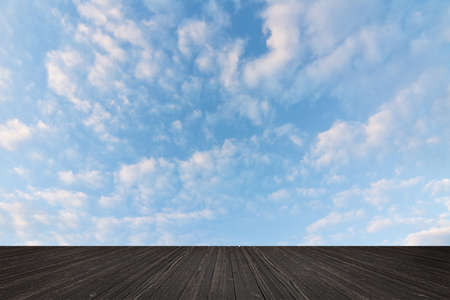 Scenic of clouds on heaven above the ground. Good background for you to put text or people on the ground.の写真素材