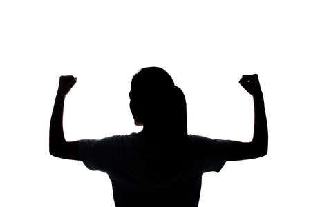 Rear view of confident Asian woman of Silhouette.の写真素材