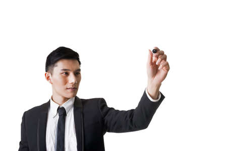 Asian businessman writing or drawing.の写真素材