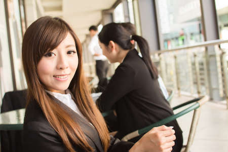 Asian business team in the city.の写真素材