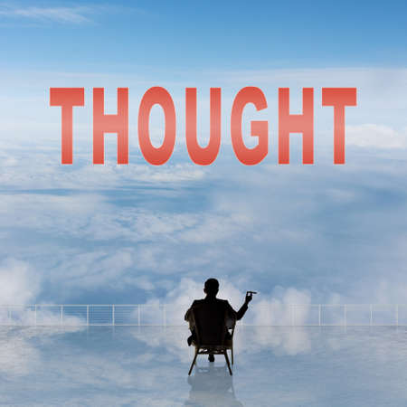 Concept of abstract concept with text on the sky and one man look at it.の写真素材