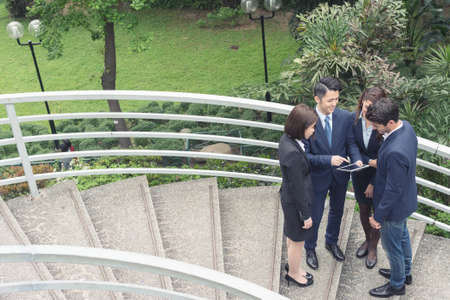 Group of business people discuss at outdoorの写真素材