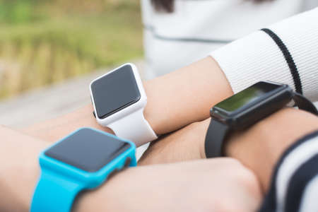 Group of people using smart watch