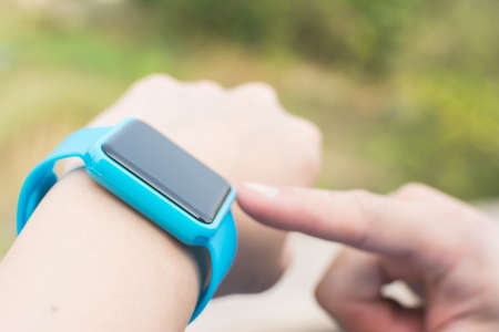 Man use of wearable watch at outdoor