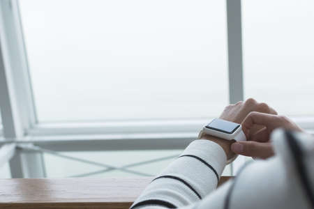 Woman using Smartwatch pay by NFCの写真素材