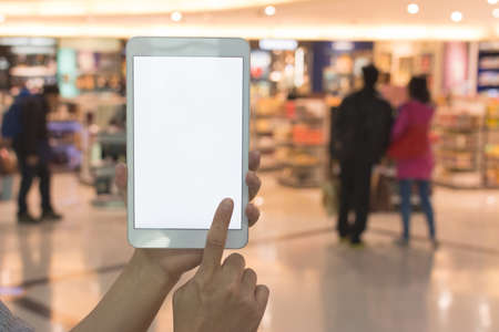 man using pad in the mall.の写真素材