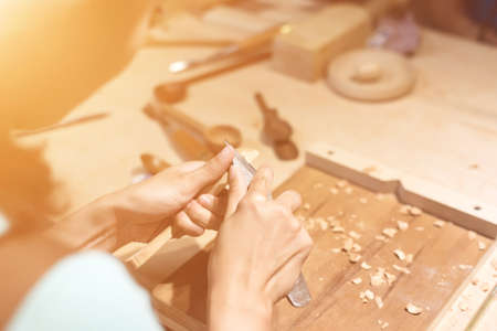 woman carpentry at home, wooden work concept