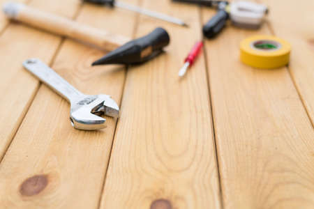 tools on the wooden backgroundの写真素材