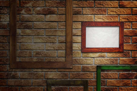 old wooden picture frame on wallの写真素材