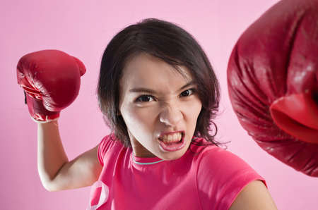 Woman fight. Pink ribbon in support of October, breast cancer awareness month.