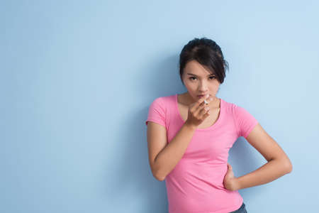 glamour smoking asian woman with copyspaceの写真素材