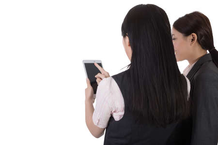 Asian business woman holding pad with confused expression, closeup portrait on white background.の写真素材
