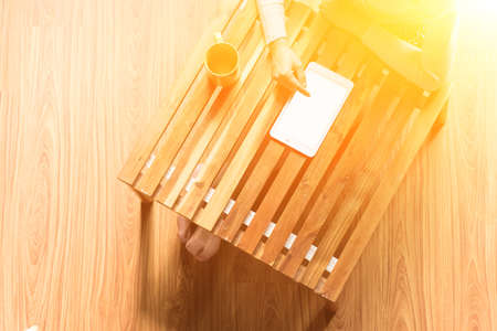 Asian woman use pad in a room, concept of technology, shopping, social community.の写真素材