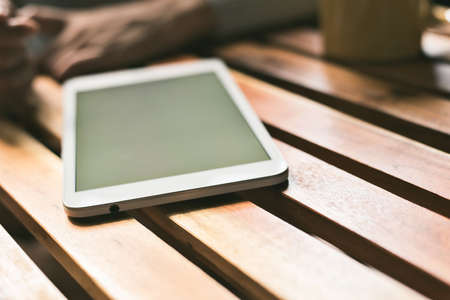 Asian woman use pad in a room, concept of technology, shopping, social community.の写真素材