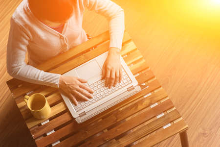 concept of woman work at home, Asian woman using laptop in a roomの写真素材