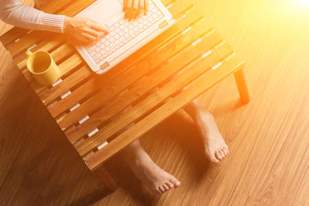 concept of woman work at home, Asian woman using laptop in a roomの写真素材