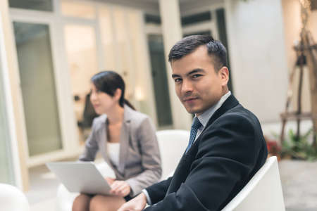 Young asian business team discuss at the outdoorの写真素材