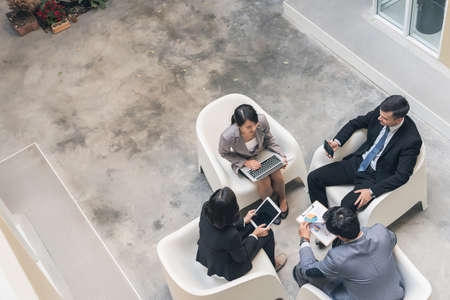 young asian business team discuss at the outdoorの写真素材