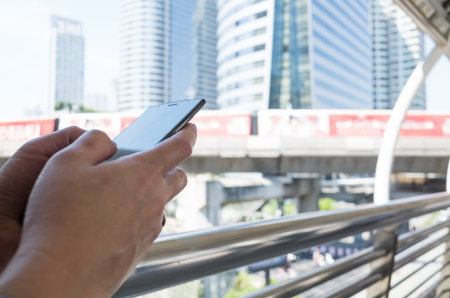 woman using cellphone, closeup image