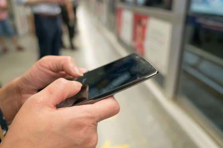 woman using cellphone, closeup imageの写真素材
