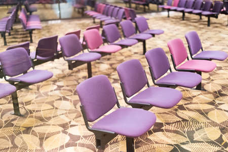 empty chairs with nobody in the airportの写真素材
