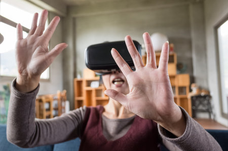 mature woman using vr headset in the house