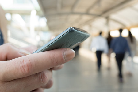 woman using cellphone, closeup image