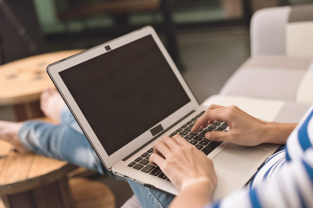 concept of working at home with woman using laptop